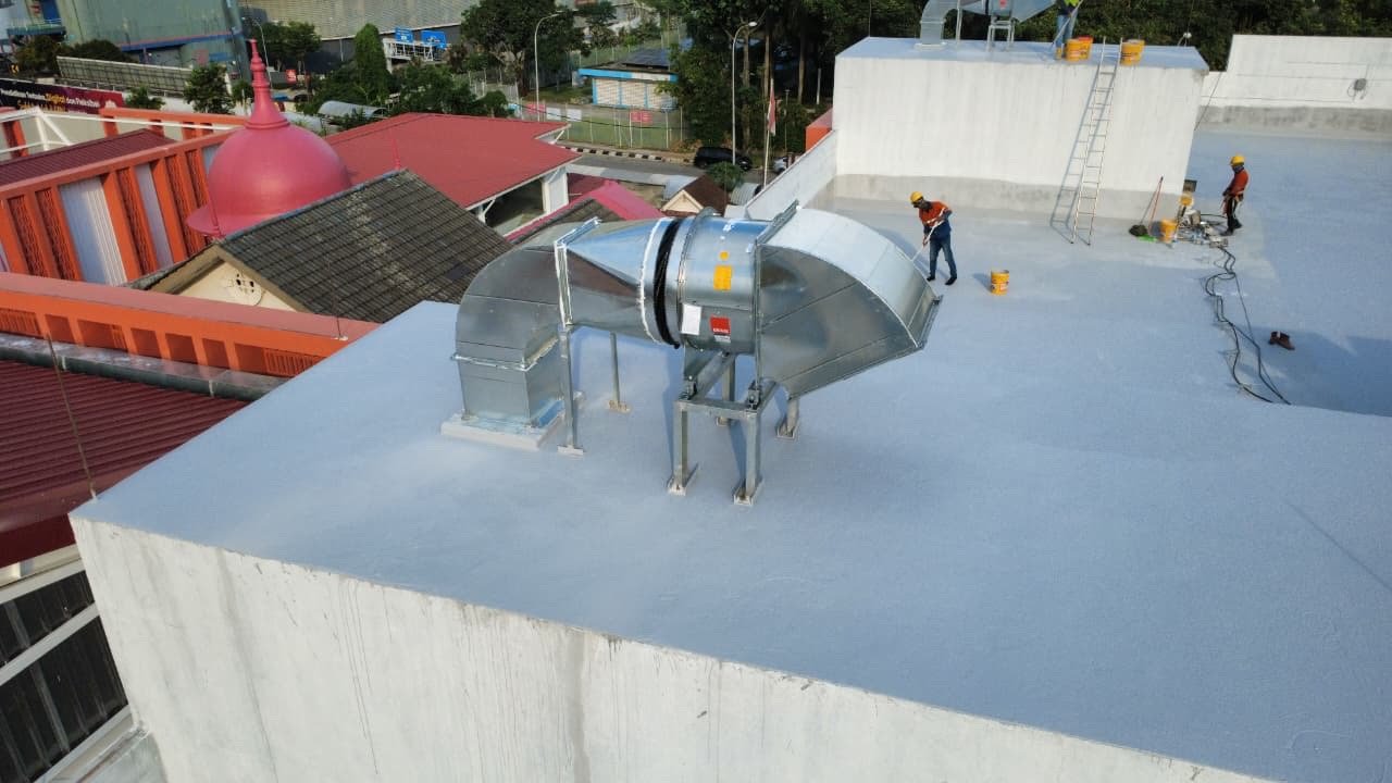 Drone view of the rooftop ventilation fan and ductwork on the finished roof